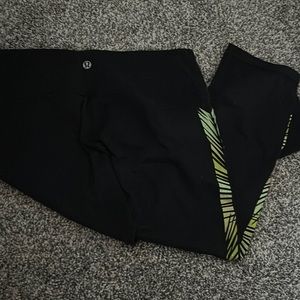 Lululemon leggings with green design up leg
